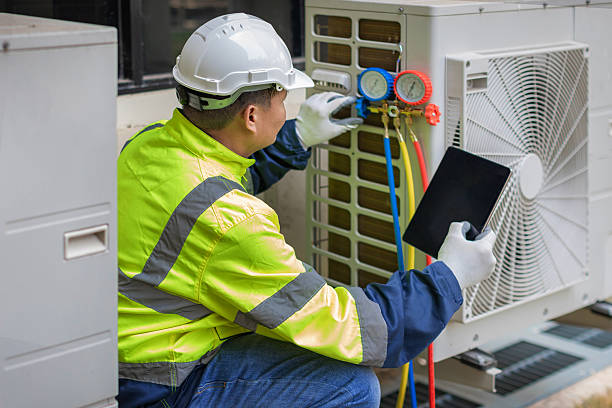 Professional Ductwork Repair technician working in Hampton Bays, NY